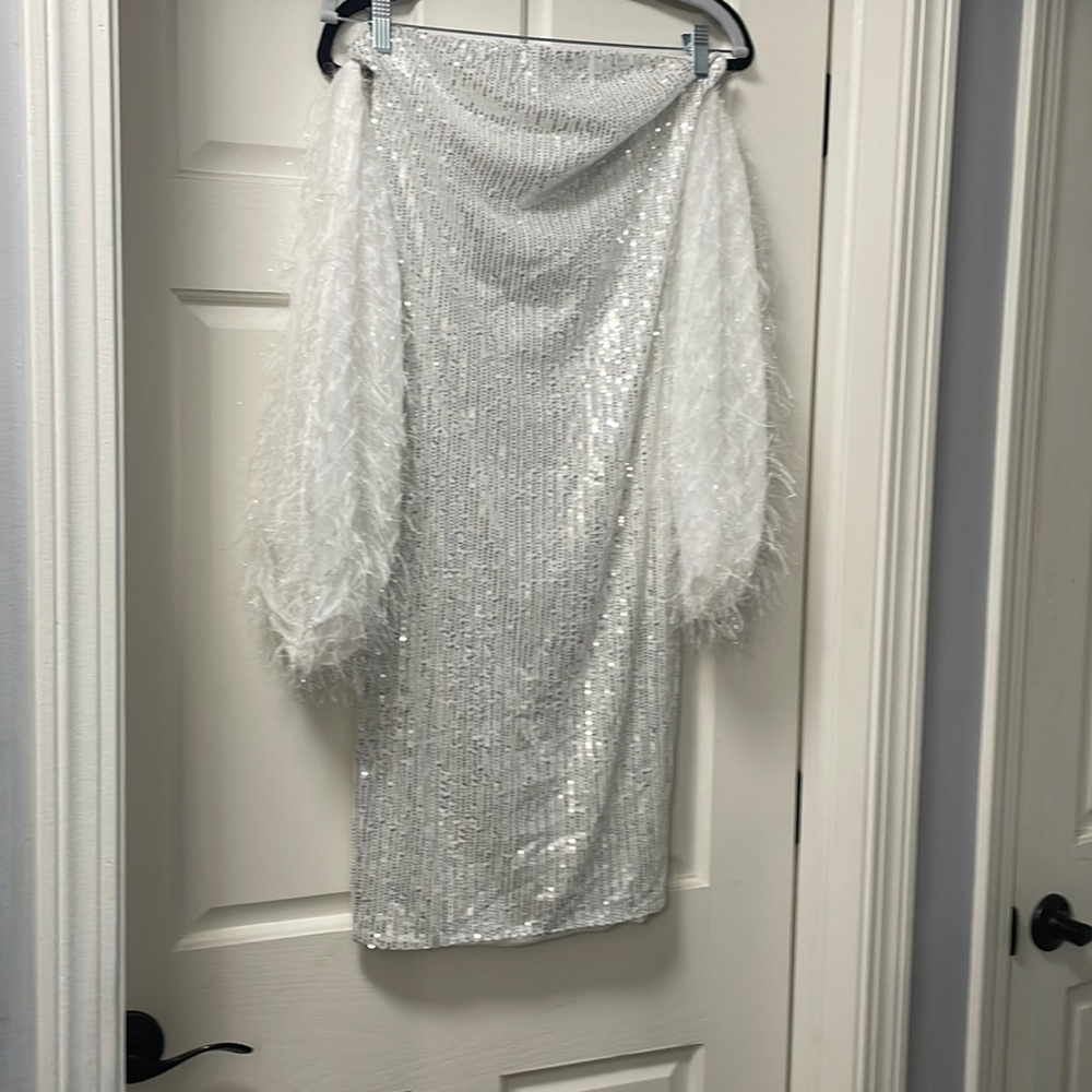 White medium sequin dress with feather off the shoulder sleeves
